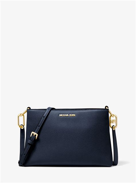 michael kors foldover crossbody navy|Pebbled Leather Convertible Crossbody Bag .